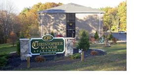 Seabrook apartment for rent - The image shows a building with a sign that reads "Christopher Manor Apartments.".
