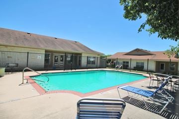Boerne apartment for rent - our resort style swimming pool is next to our building with chairs