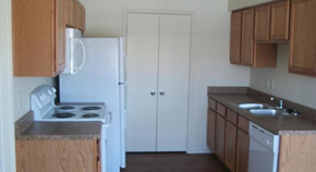 Kerrville apartment for rent - a kitchen with a stove and a refrigerator