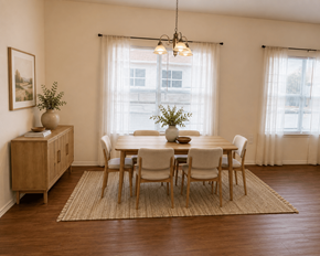 Kerrville apartment for rent - A dining room with a wooden table and chairs.