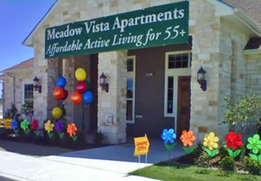 Weatherford townhouse for rent - the office apartments is decorated with colorful flowers and balloons