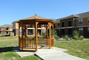 Midland apartment for rent - a gazebo in front of an apartment complex