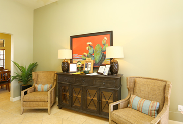 Midland apartment for rent - a living room with two chairs and a table with two lamps