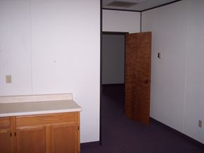 Kernersville apartment for rent - an empty room with a counter and a door