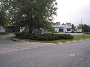 Burlington apartment for rent - A tree is in front of a building.