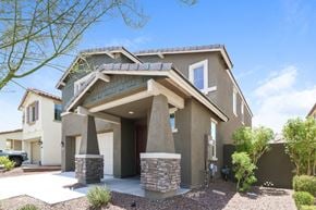 Goodyear house for rent - A modern house with a stone pillar in front.