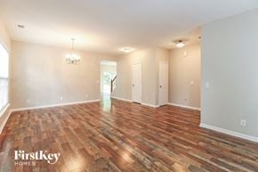 Greensboro house for rent - the living room and dining room with wood flooring