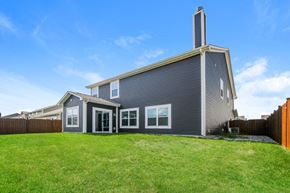 Fortville house for rent - the exterior of a house with a yard in front of it