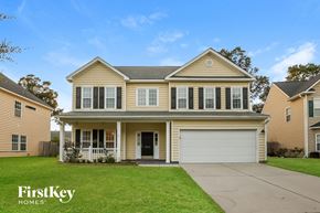 Summerville house for rent - A two-story house with a garage is for sale by FirstKey Homes.