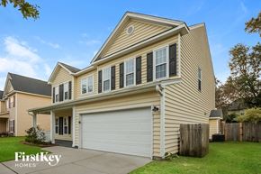 Summerville house for rent - A two-story house with a garage is for sale by FirstKey Homes.