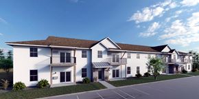 Sturgeon Bay apartment for rent - a rendering of an apartment building with a parking lot