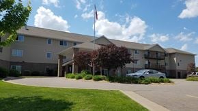 Marshfield apartment for rent - a building with a car parked in front of it