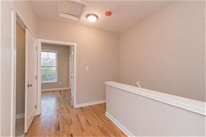 Martinsburg apartment for rent - a empty room with a white wall and wooden floors