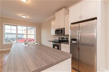 Martinsburg apartment for rent - a kitchen with a stainless steel refrigerator and a sink