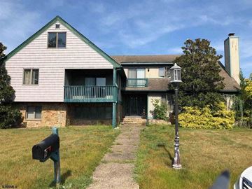 Northfield house for rent - an old house with a mailbox and a street light