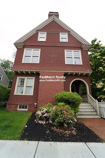 Cambridge apartment for rent - a red brick building with a sign on the front of it