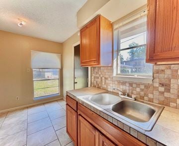 Bay City house for rent - a kitchen with a sink and a window