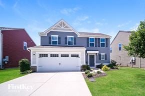 Nashville house for rent - A two-story house with a garage is for sale.