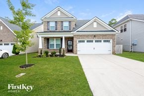Murfreesboro house for rent - a house with a white garage door in front of it