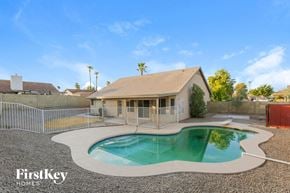 Glendale house for rent - a pool in front of a house with a pool