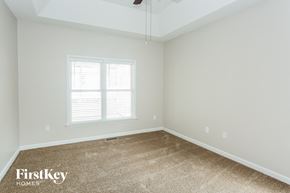 Concord house for rent - the bedroom of a home with carpet and a window
