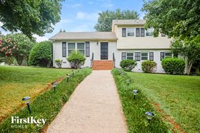 Monroe house for rent - a white house with a walkway leading up to it