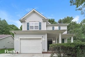 Charlotte house for rent - a white house with a white garage door