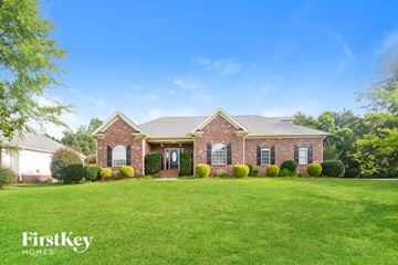 Advance house for rent - a home with a large lawn in front of it
