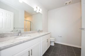 Atlantic Highlands apartment for rent - a bathroom with a sink and a toilet and a mirror