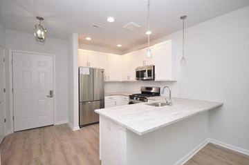 Atlantic Highlands apartment for rent - a kitchen with a counter top and a refrigerator