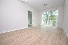 Atlantic Highlands apartment for rent - an empty living room with a large window and wooden floors
