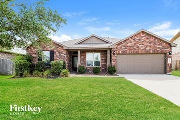 Katy house for rent - A house with a garage and a driveway is for sale.