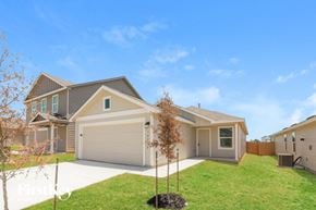 San Antonio house for rent - a house with a lawn and a driveway