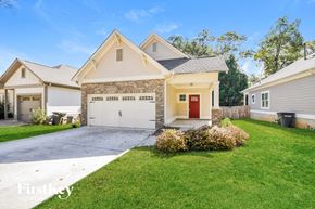 Irondale house for rent - a white house with a white garage door and a lawn