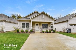 Irondale house for rent - the front of a white house with a driveway