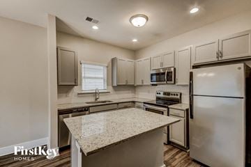 Irondale house for rent - an updated kitchen with stainless steel appliances and granite counter tops