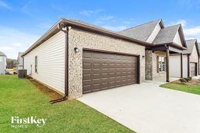 Cullman house for rent - a garage door on the side of a house
