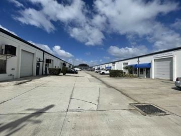 Largo apartment for rent - a row of garages on the side of a street
