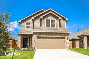 New Caney house for rent - A house with a garage door is for sale.