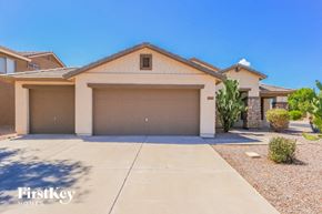 Queen Creek house for rent - a house with a driveway and a garage door