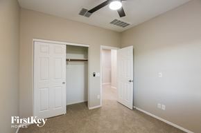 Laveen house for rent - a bedroom with two closets and a door to a closet