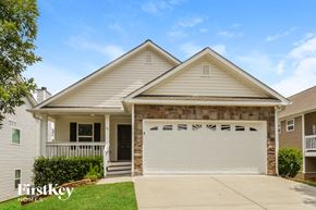 Cartersville house for rent - a white house with a white garage door
