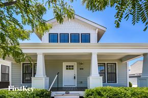 St Charles house for rent - a white house with white pillars and a white front door