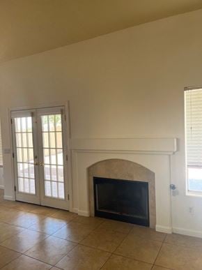 Glendale house for rent - a living room with a fireplace and a door