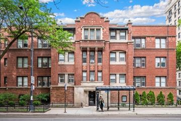 Chicago apartment for rent - a red brick building on a city street