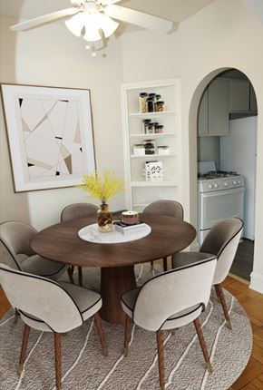 Chicago apartment for rent - A dining room with a round table and chairs.
