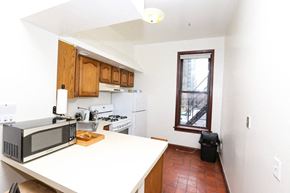 Chicago apartment for rent - a kitchen with a counter top and a microwave