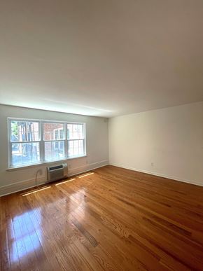 Ardmore apartment for rent - A room with a window and a wooden floor.
