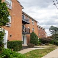 Bala Cynwyd apartment for rent - A brick building with a white door and windows.