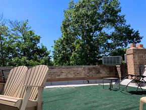 Ardmore apartment for rent - Two chairs are on a green lawn.